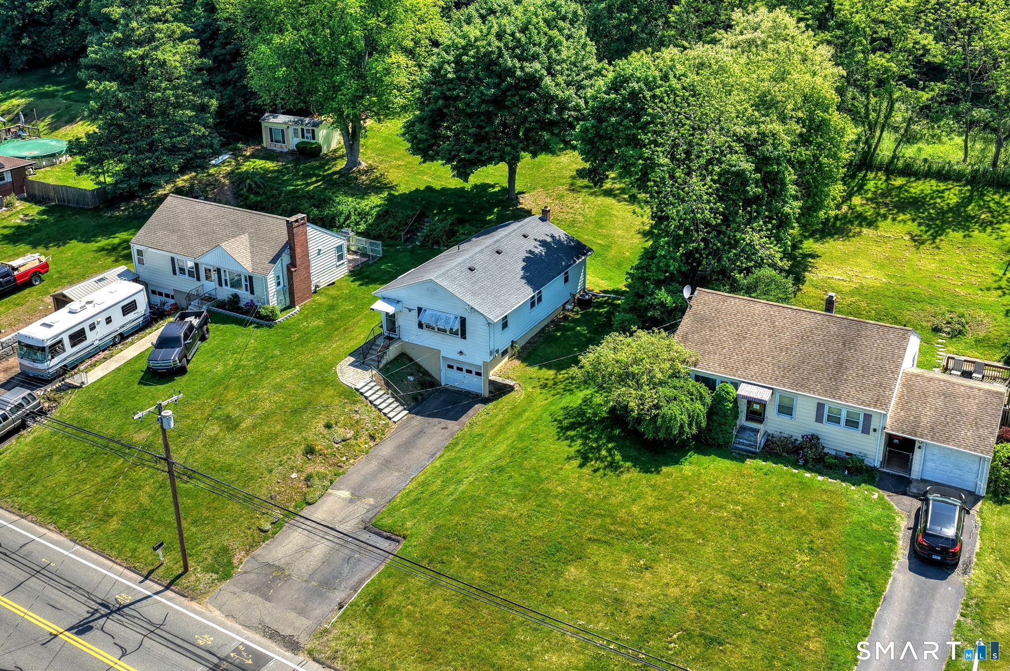 212 Swain Avenue Meriden, CT 06450 - Photo 6 of 38 an aerial view of a house with garden space and street view
