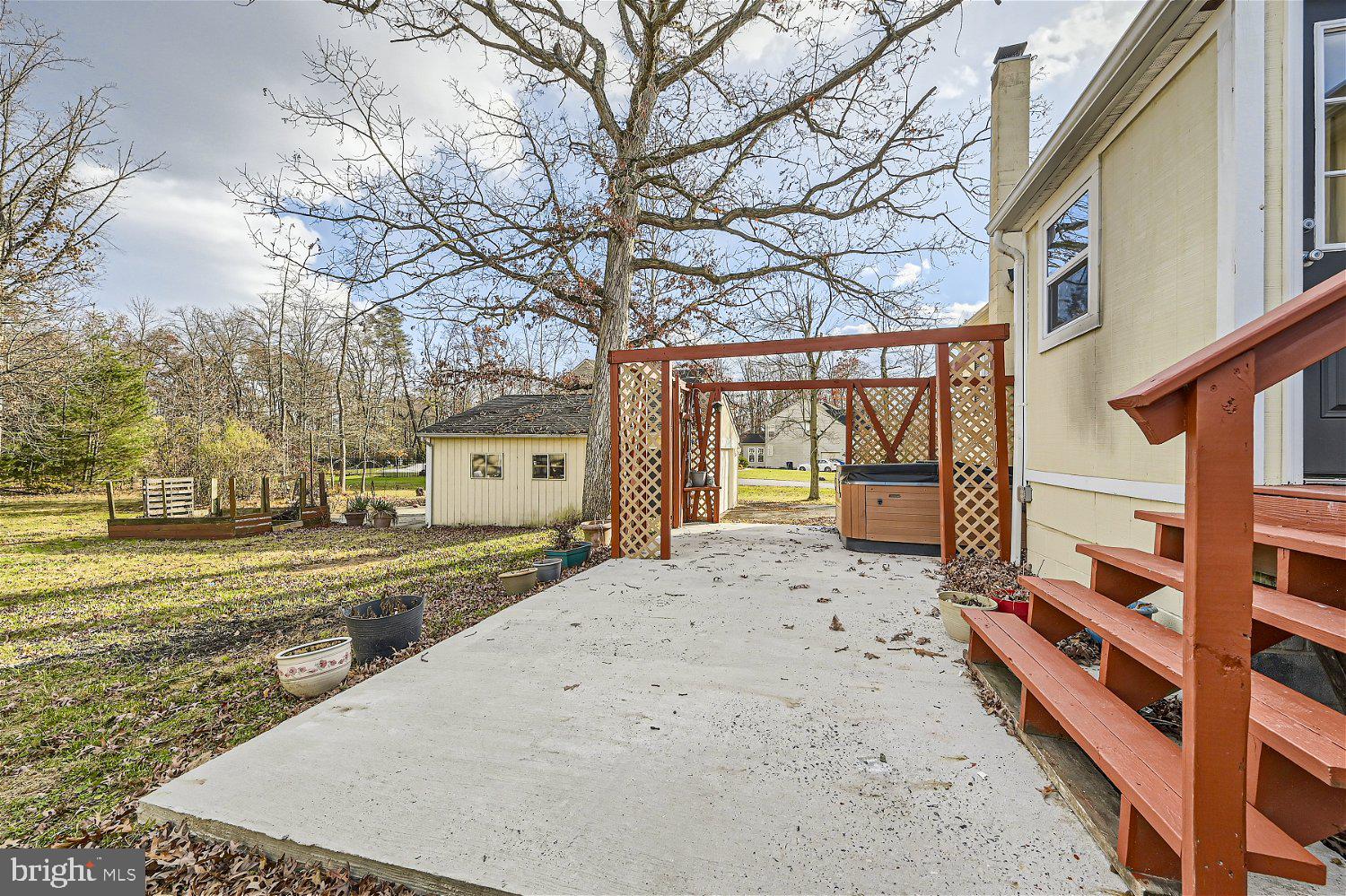 10517 Vincent Road White Marsh, MD 21162 - Photo 24 of 27 REAR PATIO WITH HOT TUB