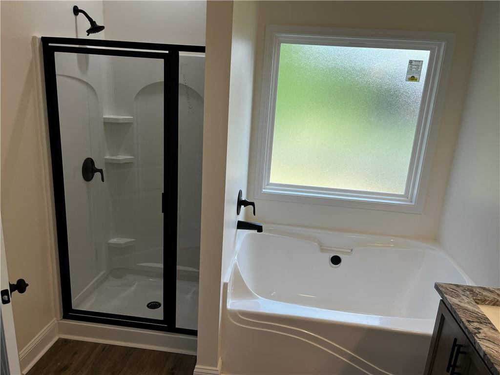 1932 Cochran Ridge Road Hiram, GA 30141 - Photo 24 of 30 a bathroom with a bathtub
