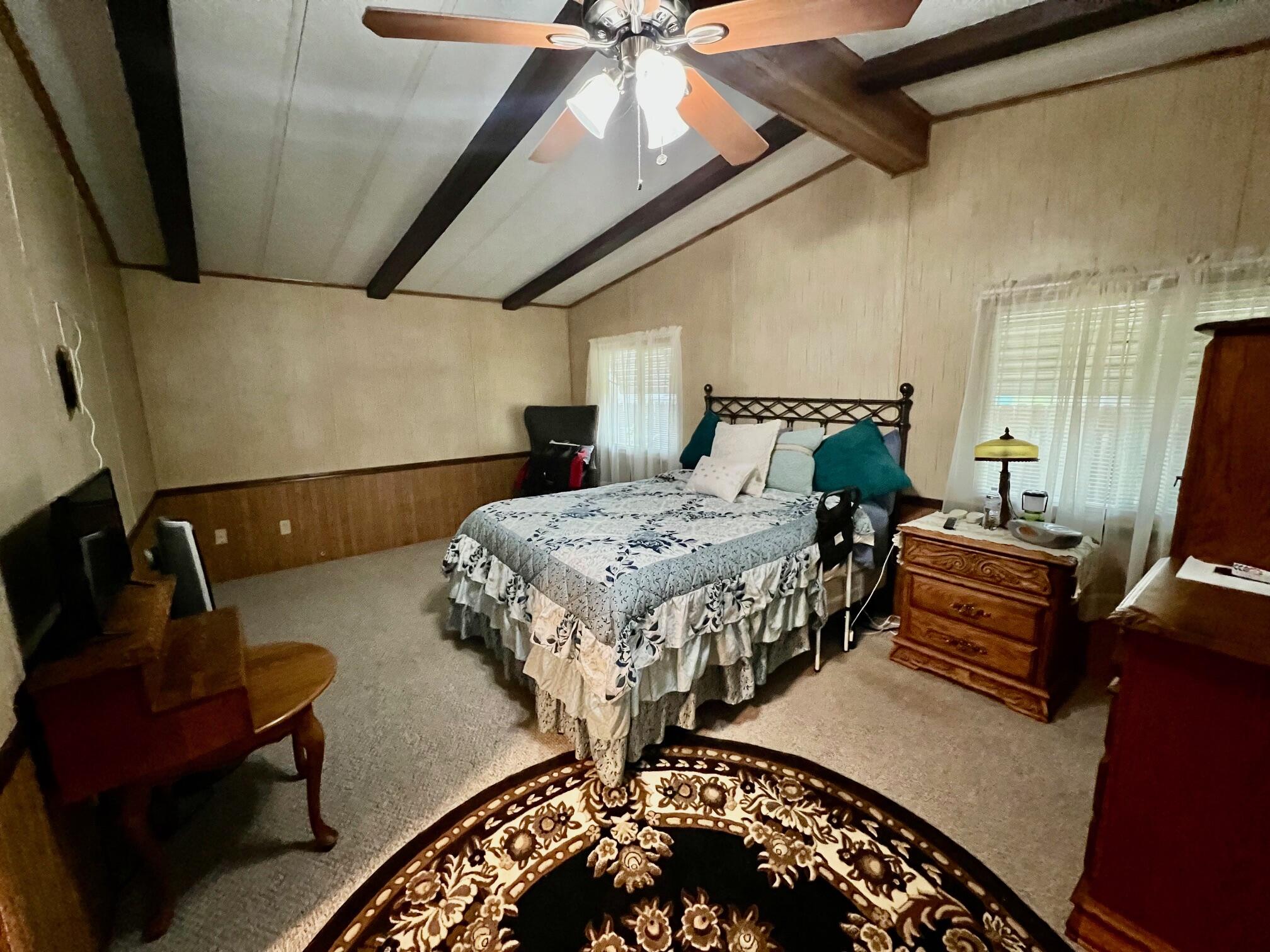 180 South Main Street, Unit SPC 36 Red Bluff, CA 96080 - Photo 15 of 18 a bedroom with bed and a window