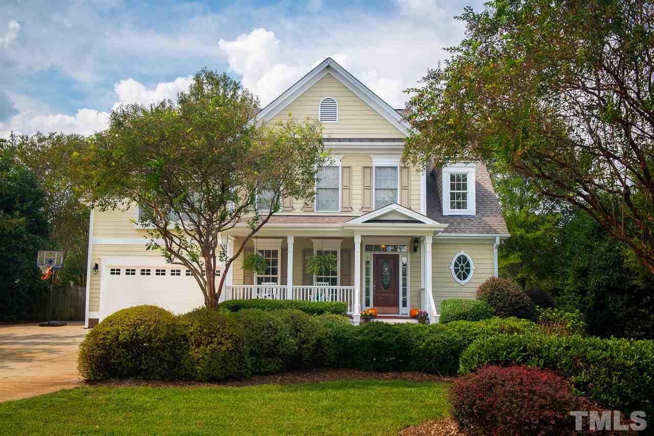 81 Rand Road Raleigh, NC 27603 - Photo 1 of 24 a front view of a house with a yard