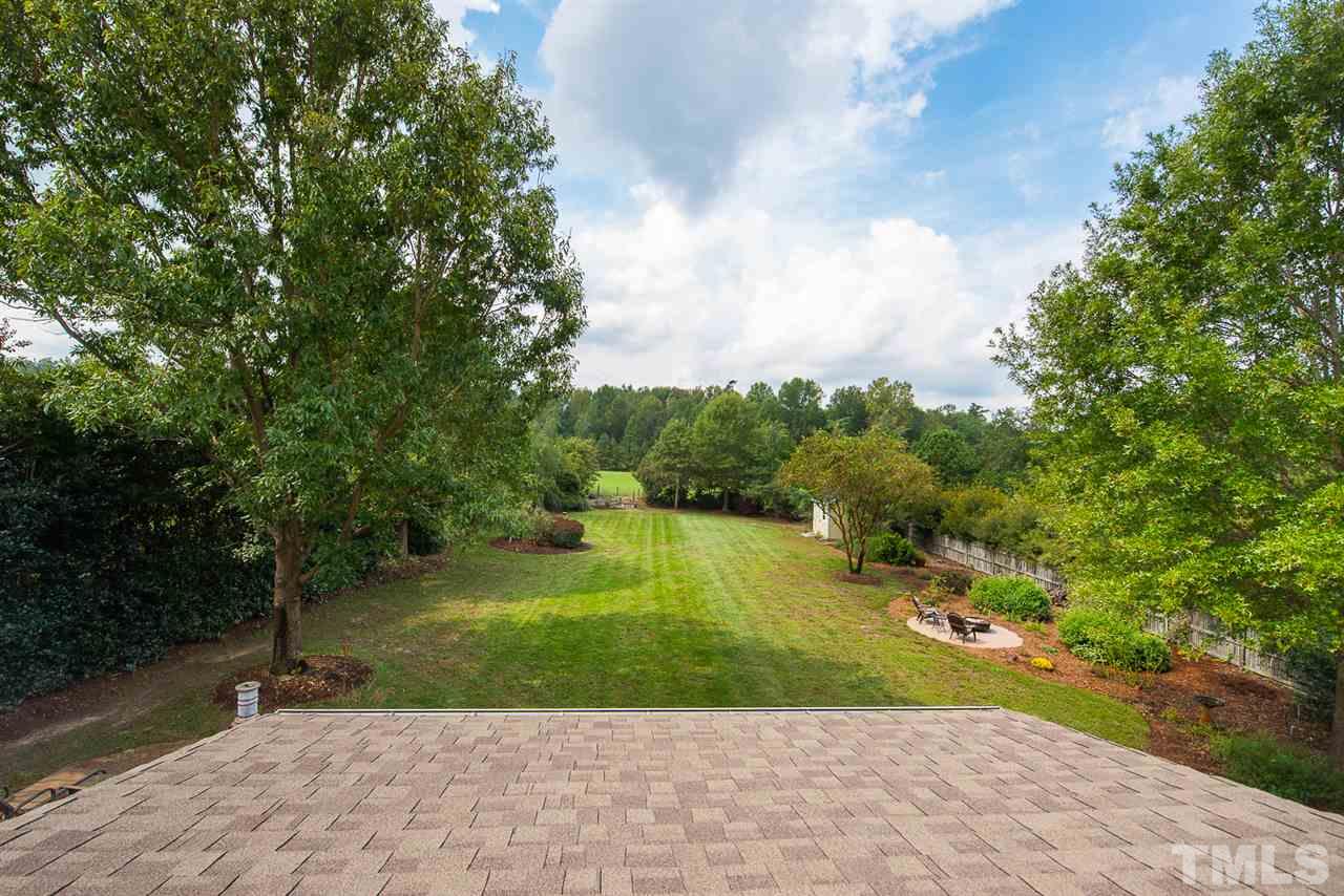 81 Rand Road Raleigh, NC 27603 - Photo 23 of 24 a view of a garden with a building
