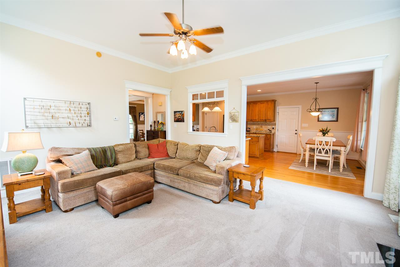 81 Rand Road Raleigh, NC 27603 - Photo 6 of 24 a living room with furniture and a large window