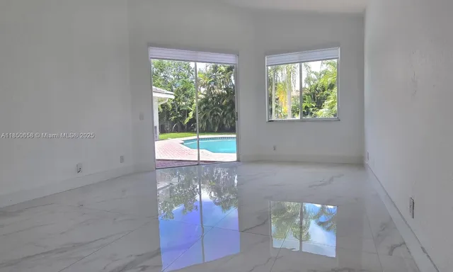 an empty room with windows