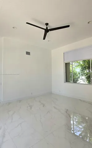 a view of a small space with a window