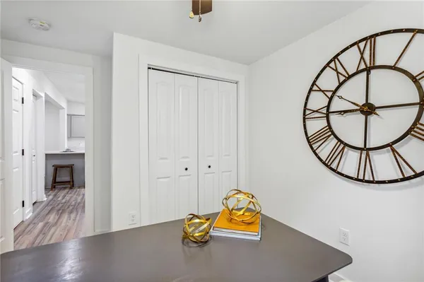 a view of a livingroom with furniture and wooden floor