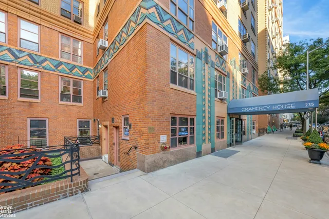 a view of a building with sitting area