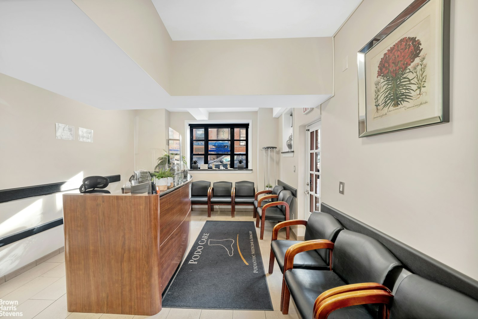 235 East 22nd Street, Unit 1EF Manhattan, NY 10010 - Photo 2 of 15 a living room with furniture and a book shelf