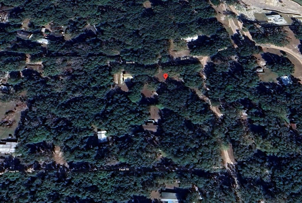 107 Dixie Street Hawthorne, FL 32640 - Photo 10 of 14 a view of outdoor space and covered with lots of trees