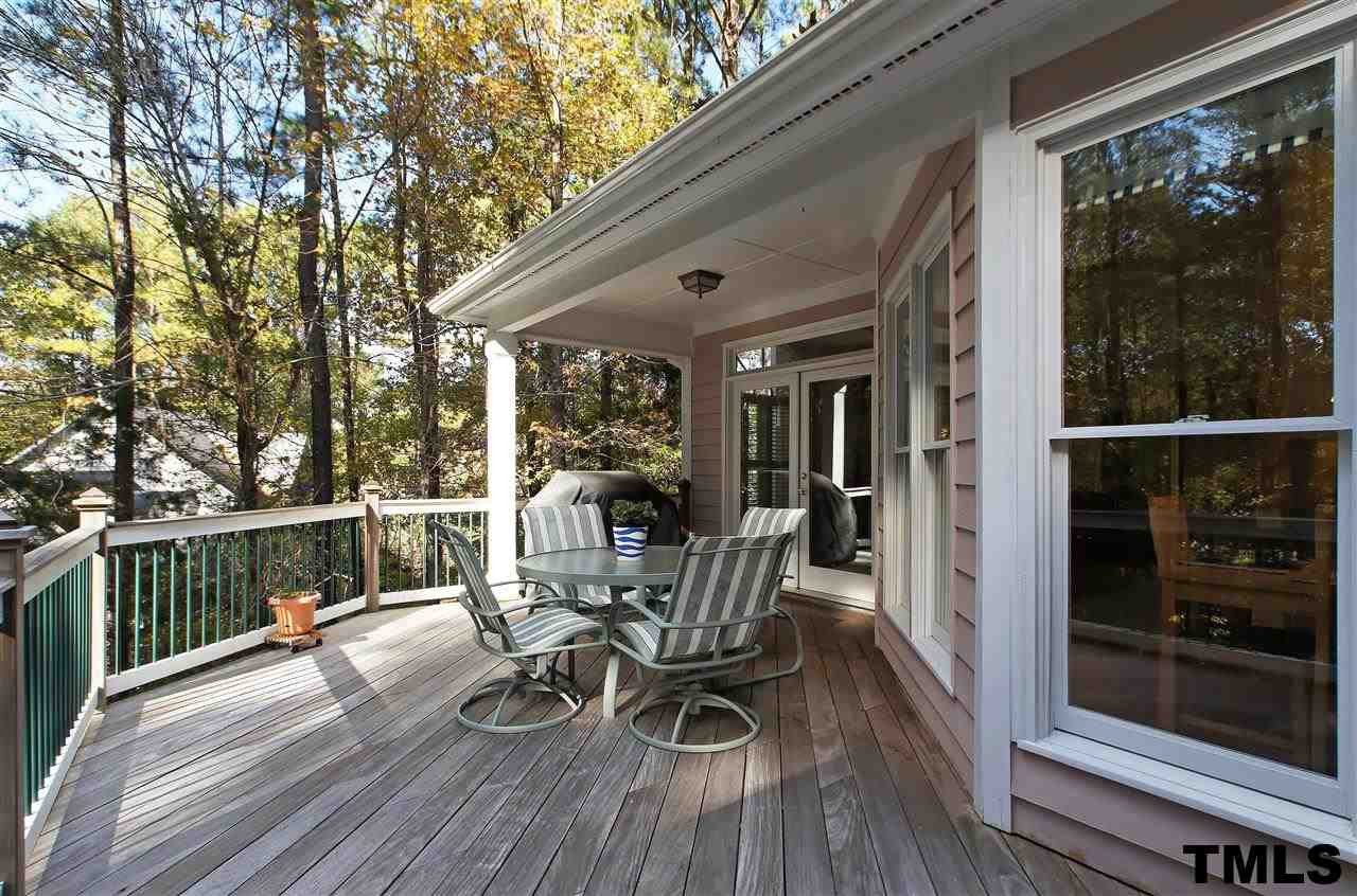 2321 Primrose Valley Court Raleigh, NC 27613 - Photo 22 of 24 LARGE ENTERTAINERS DECK OVER LOOKING ALMOST ACRE LOT! DECK