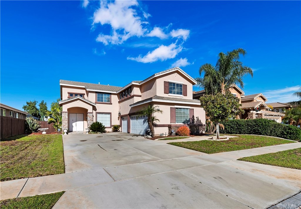 609 Raphael Drive Corona, CA 92882 - Photo 1 of 1 a front view of a house with a yard