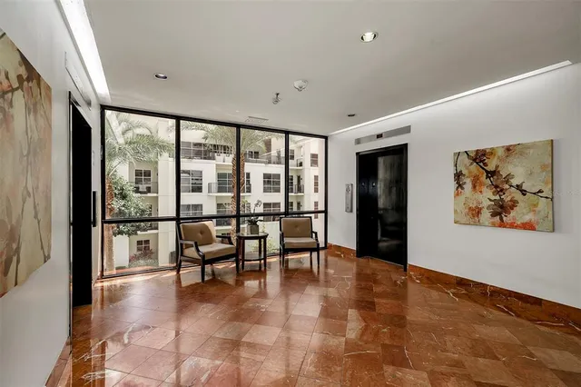 an aerial view of a house with outdoor space and street view