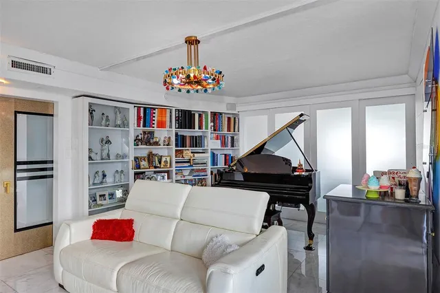 a bedroom with a bed and a mirror