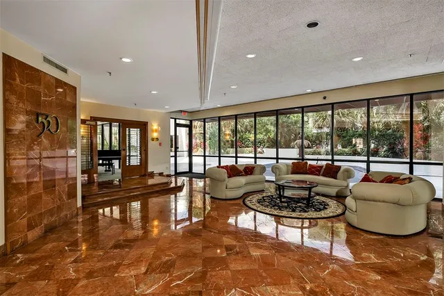 a very nice looking dining room with furniture