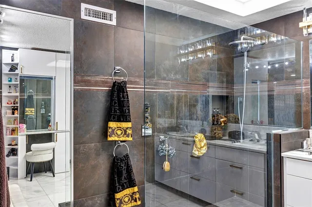 a bedroom with furniture and a book shelf