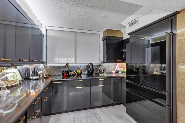 a view of a lake with tall buildings