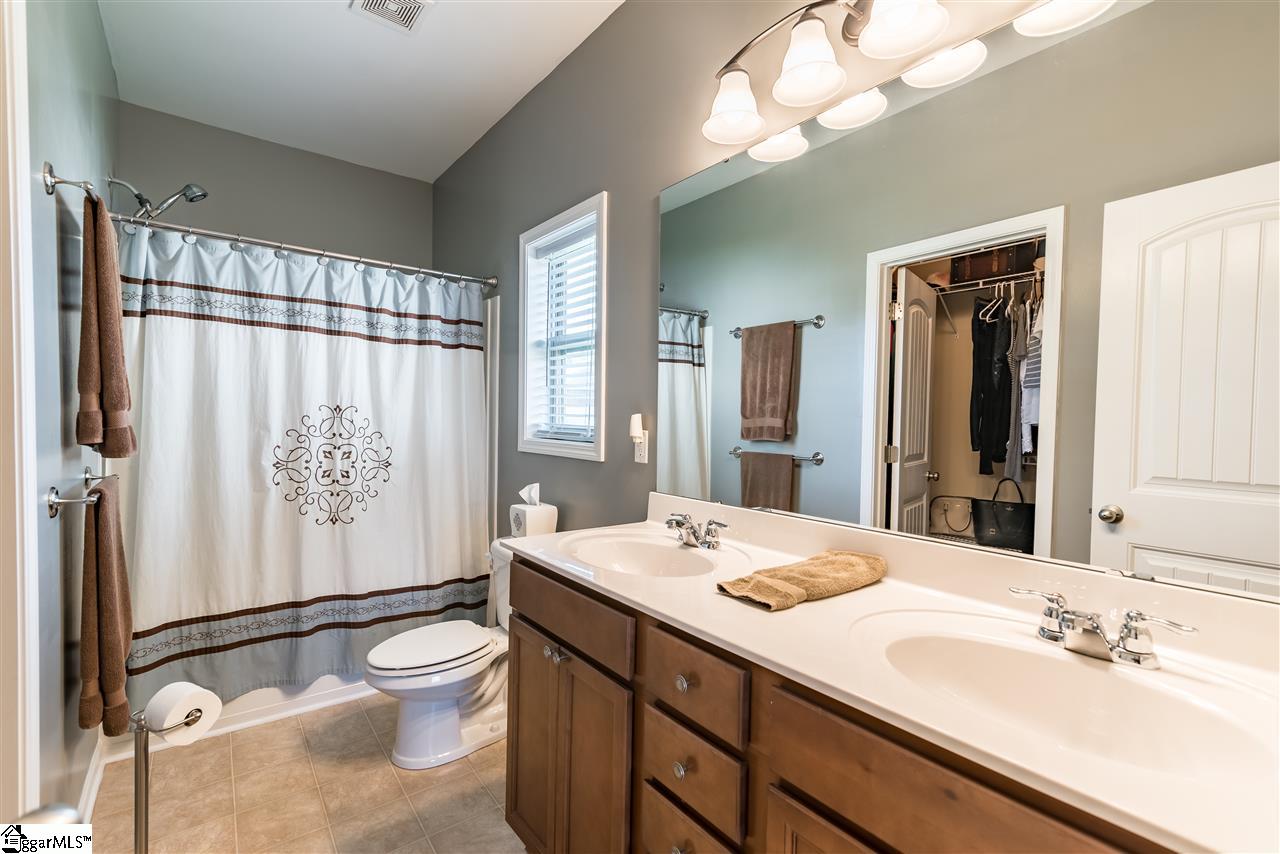 104 Salthouse Road Simpsonville, SC 29680 - Photo 14 of 31 Dual sinks, Large garden tub/shower combo and a large walk in closet complete this en-suite!