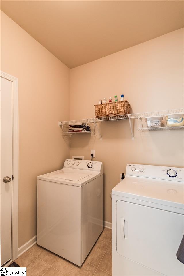 104 Salthouse Road Simpsonville, SC 29680 - Photo 8 of 31 Spacious walk-in Laundry room accessible from the garage and kitchen.