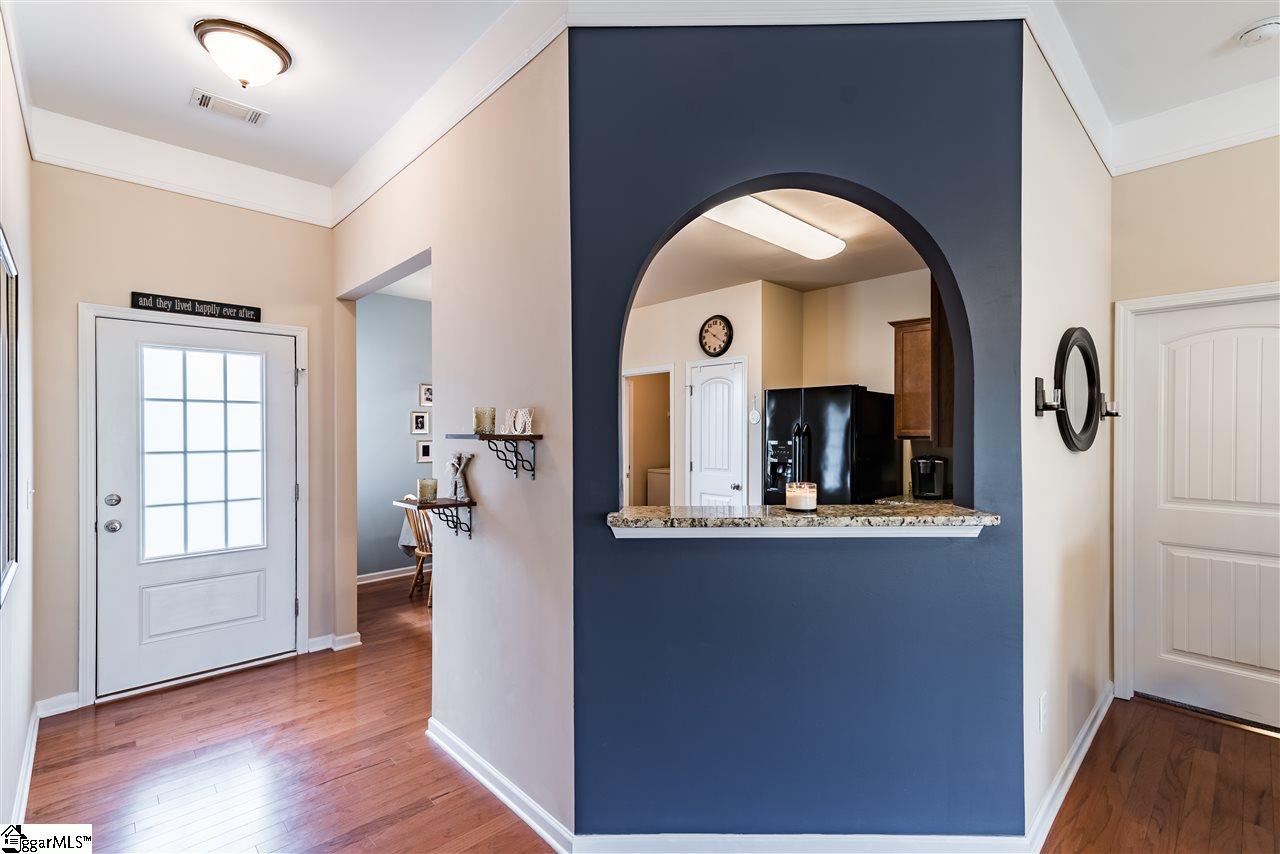 104 Salthouse Road Simpsonville, SC 29680 - Photo 9 of 31 Love the view of the kitchen and entryway from the living room!