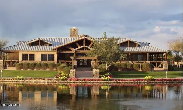 a view of a lake with a house