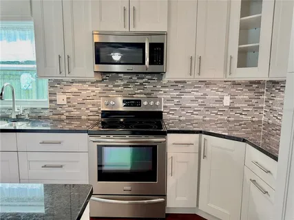 a bedroom with a bed and walk in closet