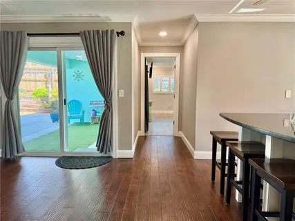 a bathroom with a shower toilet and a shower curtain