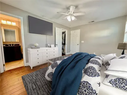 a swimming pool with outdoor seating and outdoor seating