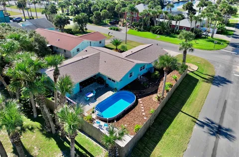 an aerial view of a city with lots of residential buildings