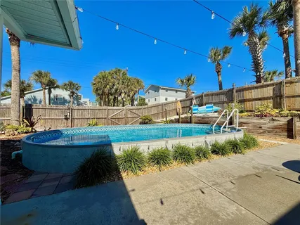 an aerial view of house with yard