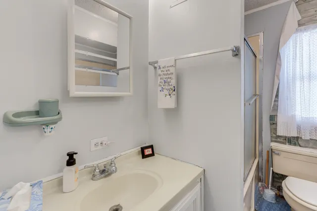 a view of a yard with a tree