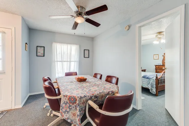 a bed room with furniture and a window