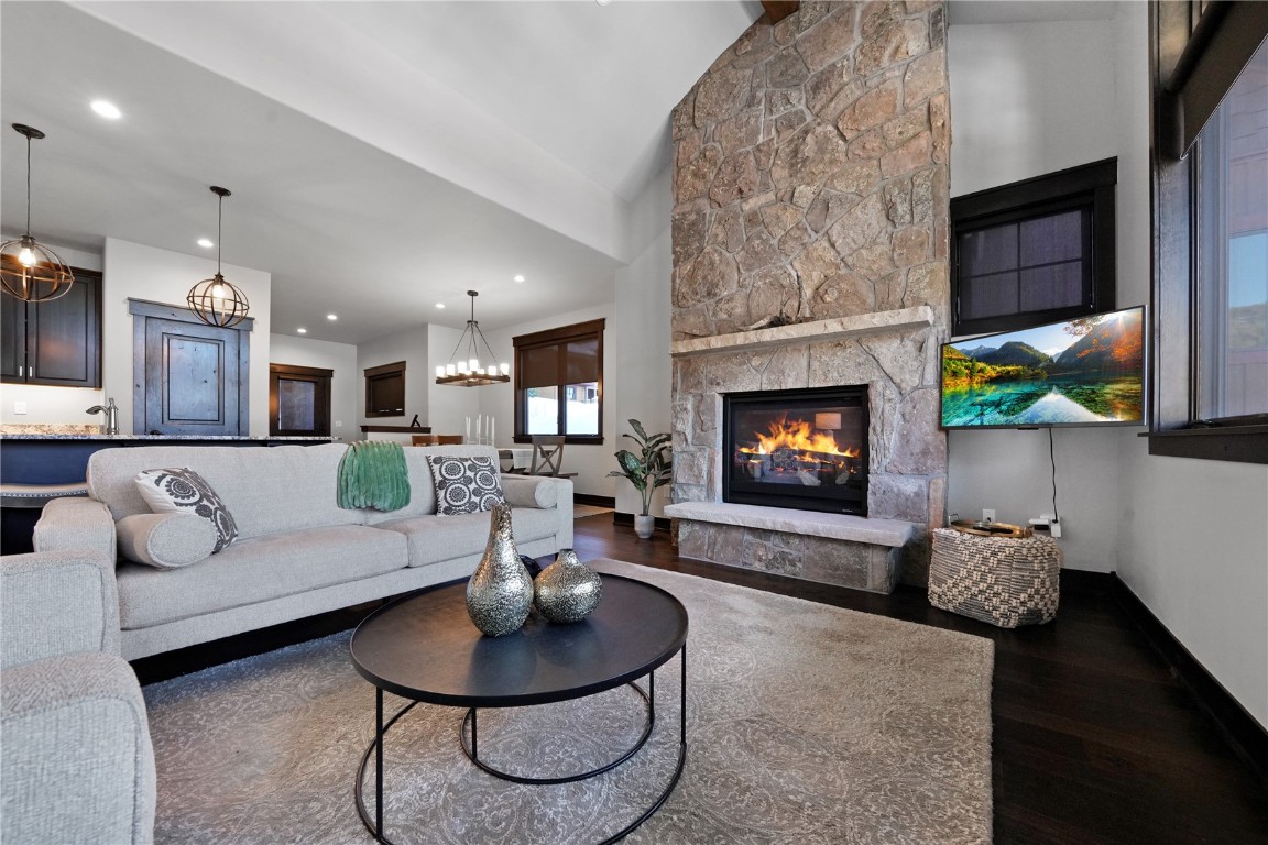 851 Independence Road Keystone, CO 80435 - Photo 1 of 50 a living room with furniture and a fireplace