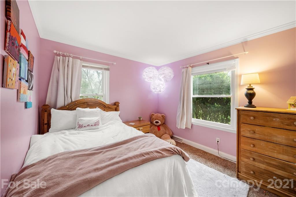 2508 Milton Road Charlotte, NC 28215 - Photo 11 of 17 a bedroom with a bed and a window