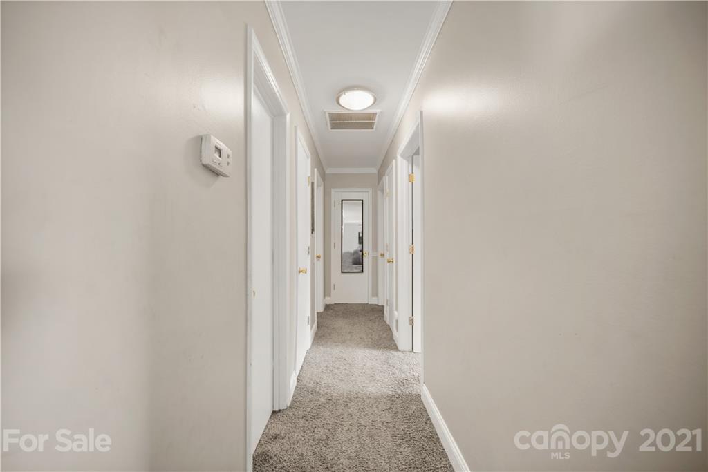 2508 Milton Road Charlotte, NC 28215 - Photo 14 of 17 a view of a hallway with wooden floor