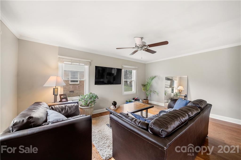 2508 Milton Road Charlotte, NC 28215 - Photo 4 of 17 a living room with furniture and a flat screen tv