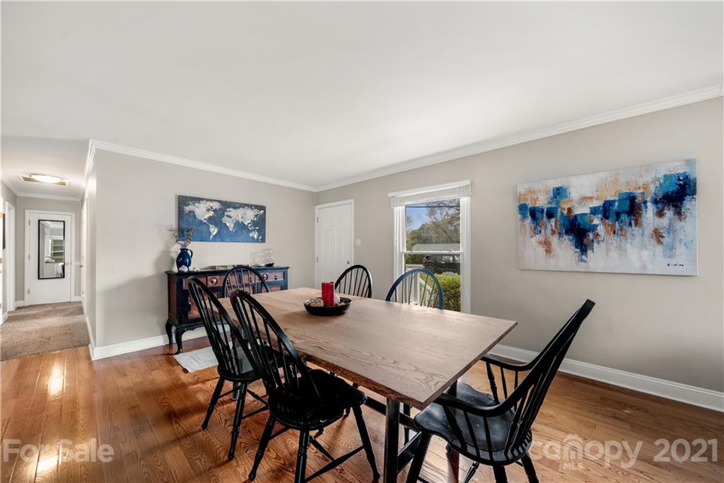 2508 Milton Road Charlotte, NC 28215 - Photo 7 of 17 a view of a dining room with furniture and wooden floor