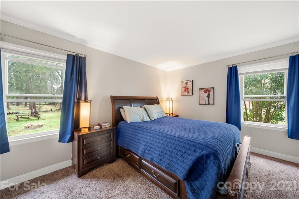 2508 Milton Road Charlotte, NC 28215 - Photo 9 of 17 a bedroom with a bed and large window