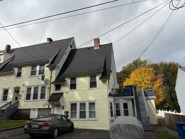 a car parked in front of a building