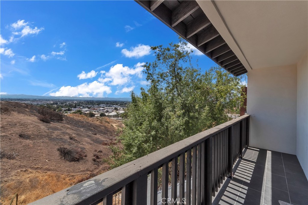 12524 Chanute Street Pacoima, CA 91331 - Photo 36 of 47 a view of a balcony with wooden floor