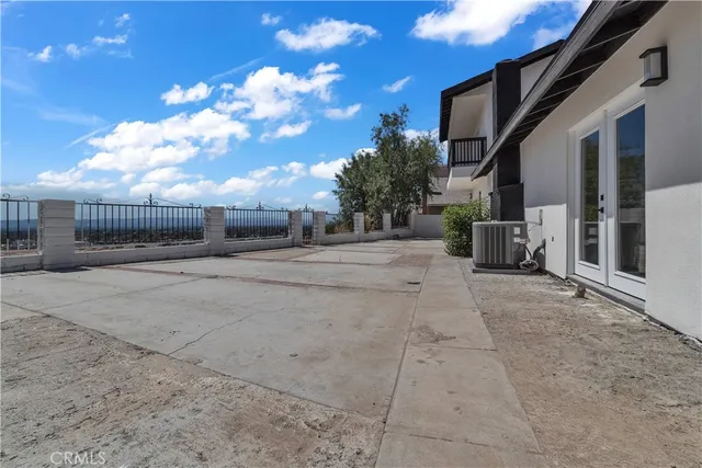 a view of a house with a pathway
