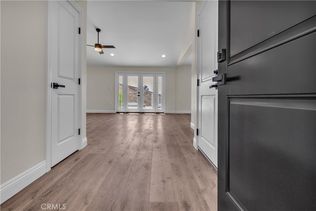 12524 Chanute Street Pacoima, CA 91331 - Photo 8 of 47 a view of empty room with wooden floor