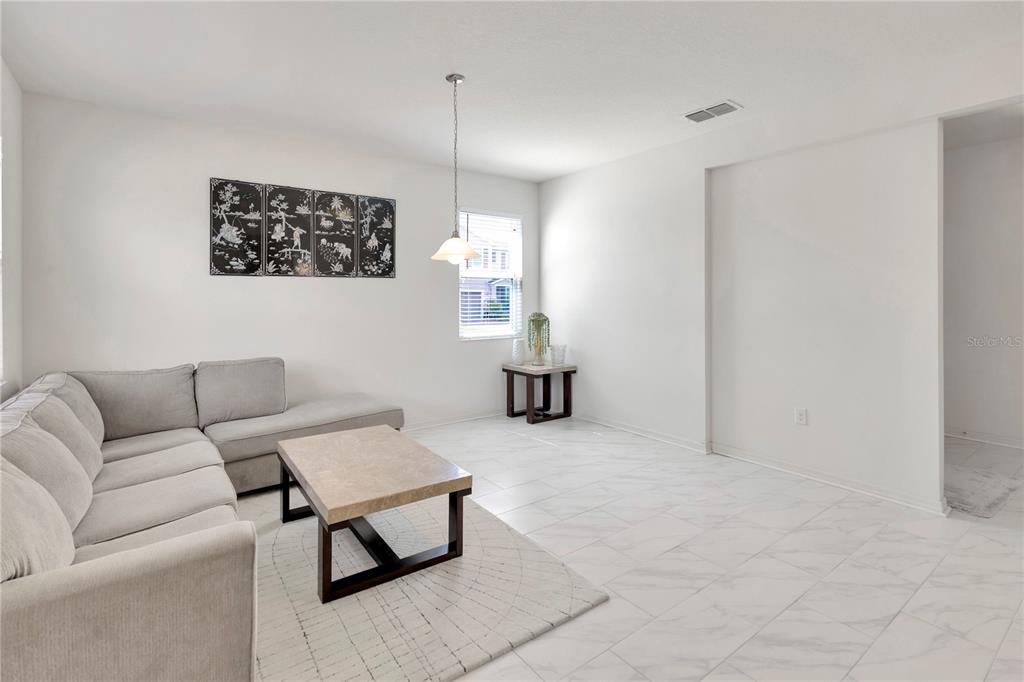 11530 Brighton Knoll Loop Riverview, FL 33579 - Photo 3 of 64 a living room with furniture