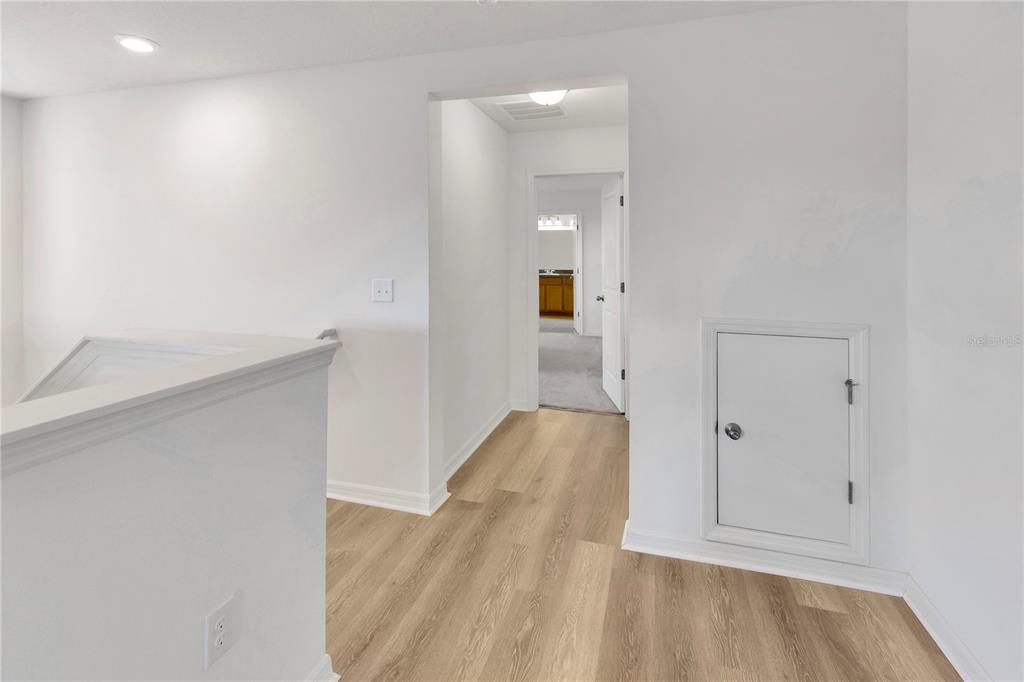 11530 Brighton Knoll Loop Riverview, FL 33579 - Photo 47 of 64 a view of hallway with wooden floor
