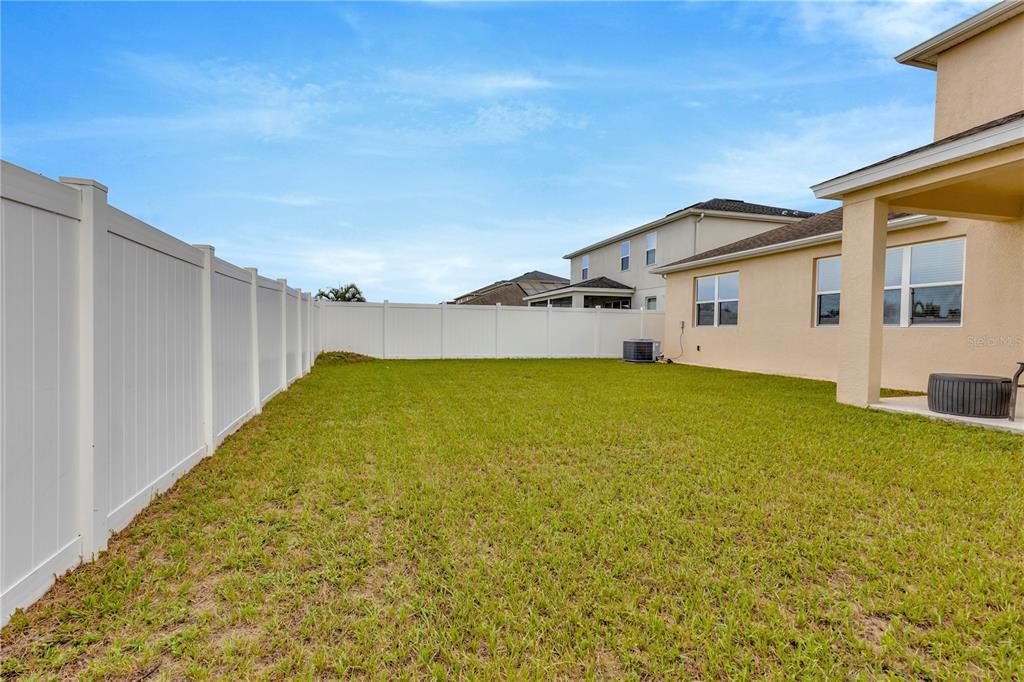 11530 Brighton Knoll Loop Riverview, FL 33579 - Photo 52 of 64 a view of a house with a yard