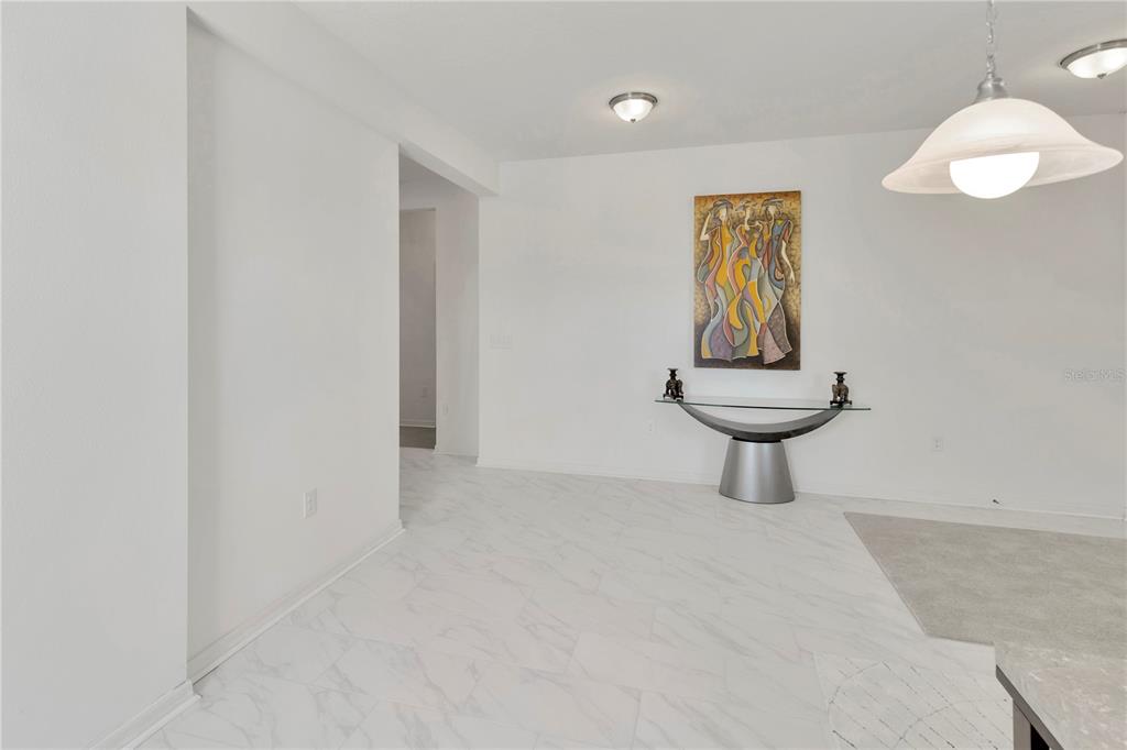 11530 Brighton Knoll Loop Riverview, FL 33579 - Photo 6 of 64 a view of an empty room with a window