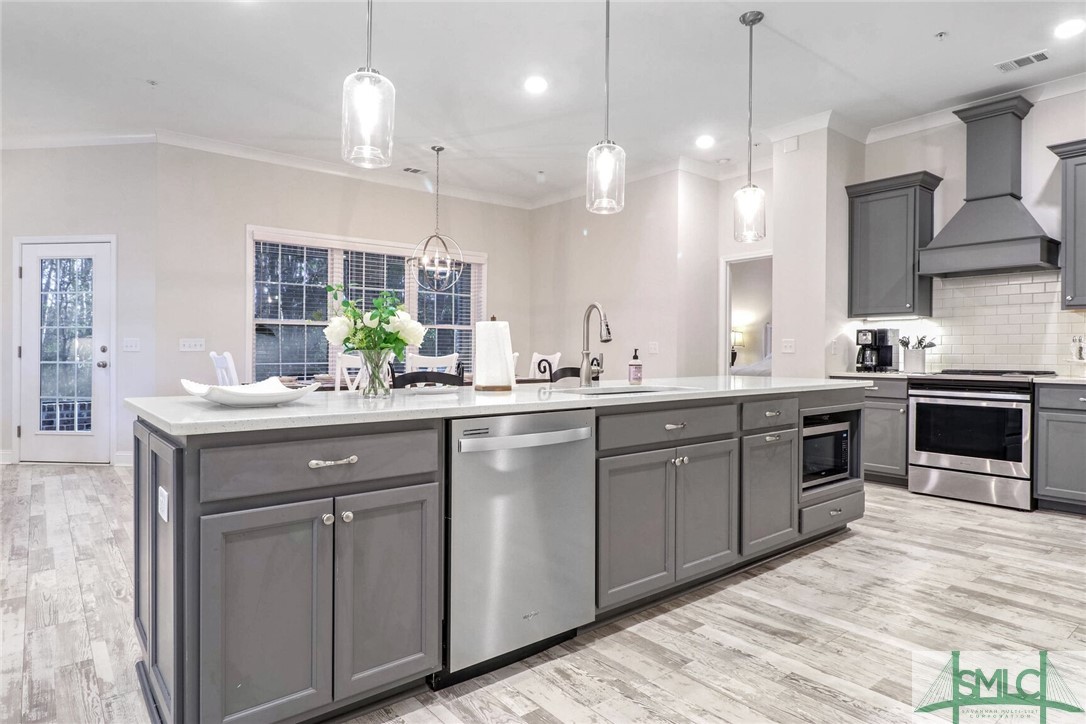 1201 Woodside Ridge Savannah, GA 31405 - Photo 5 of 27 Spacious and elegant kitchen w/quartz countertops