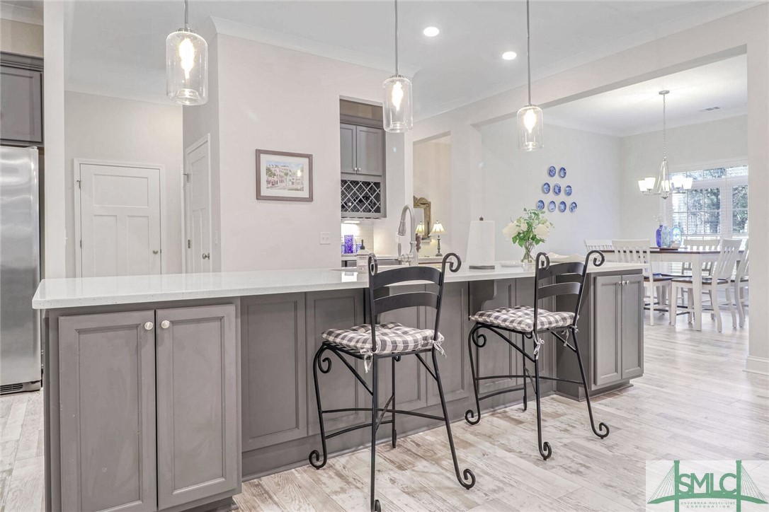 1201 Woodside Ridge Savannah, GA 31405 - Photo 7 of 27 Charming wine nook w/built in cabinetry and wine c