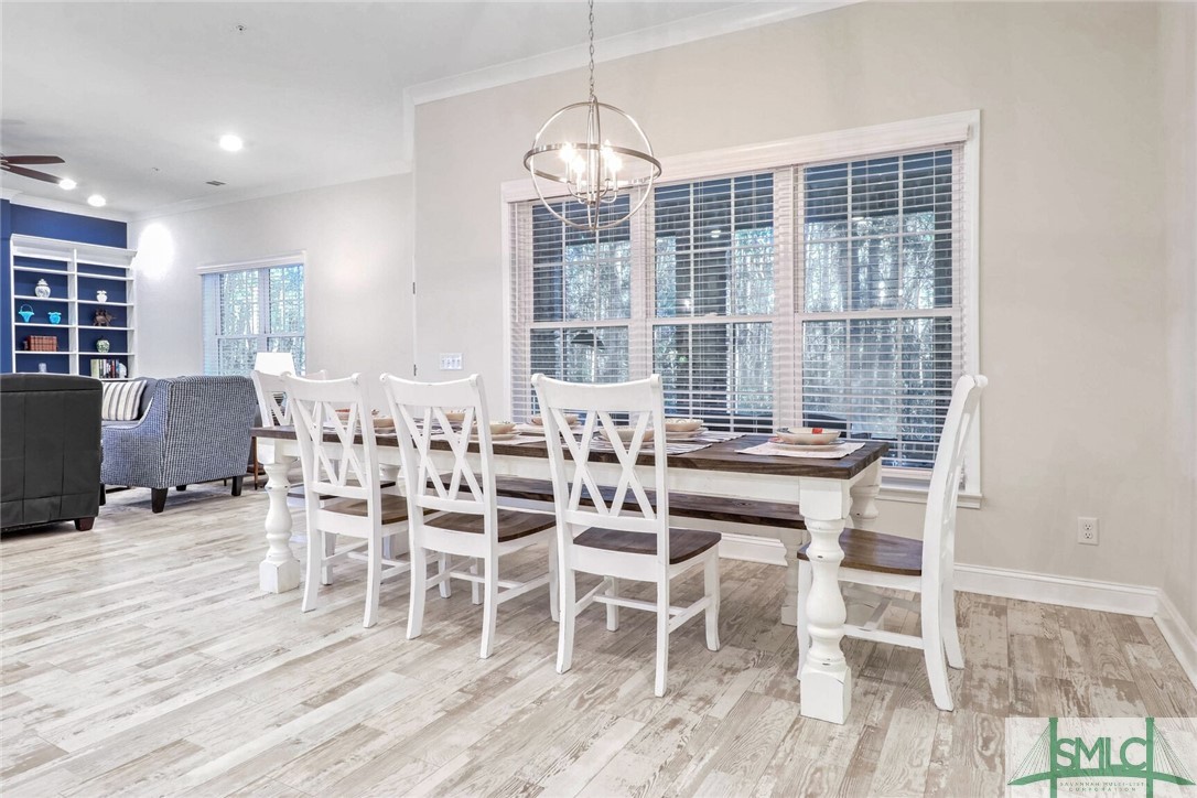 1201 Woodside Ridge Savannah, GA 31405 - Photo 8 of 27 Expansive dining area bathed in natural light