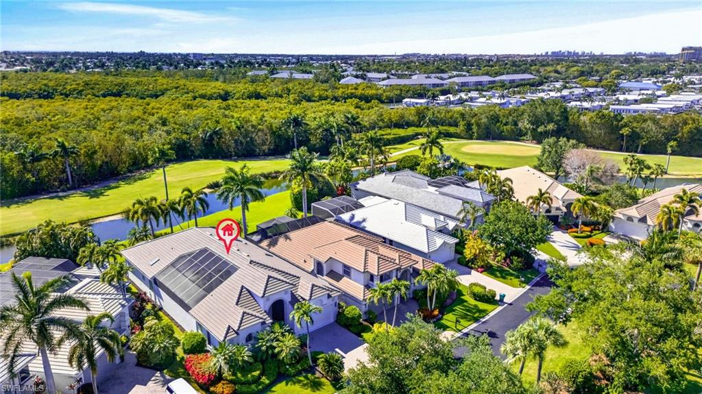 3296 Lookout Lane Naples, FL 34112 - Photo 33 of 39 an aerial view of residential house with outdoor space and swimming pool