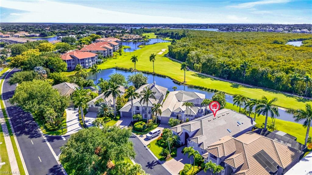 3296 Lookout Lane Naples, FL 34112 - Photo 34 of 39 an aerial view of a pool patio swimming pool and outdoor seating